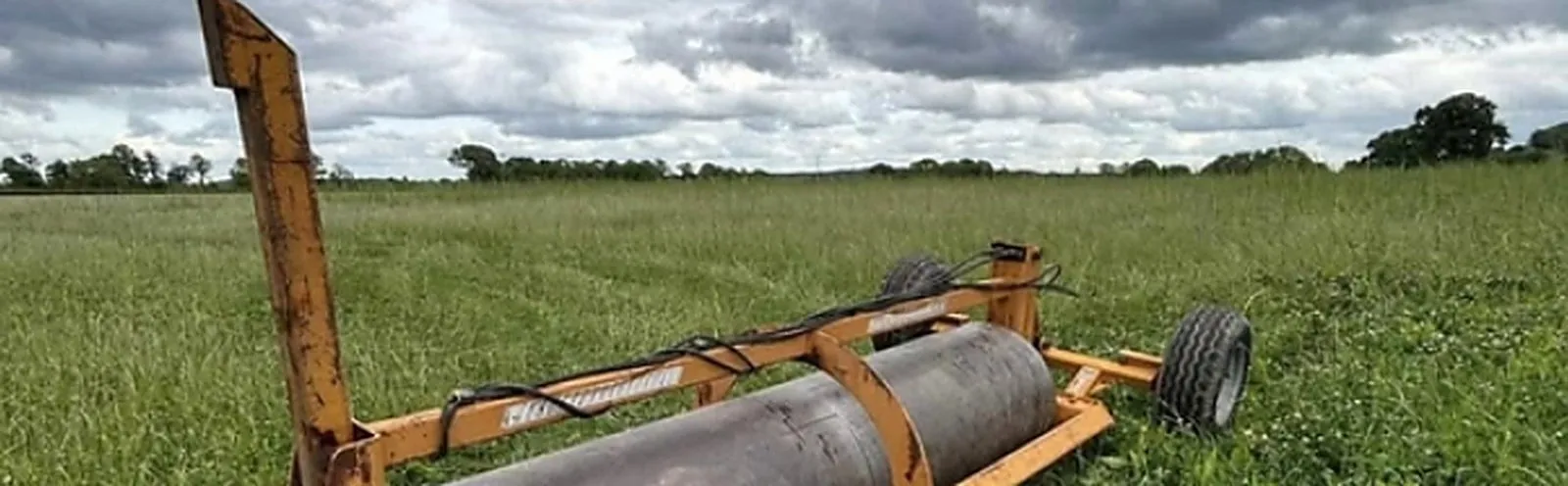 Rolling a field near Alveley
