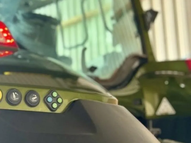 Valtra T175 tractor parked in the yard, offside view
